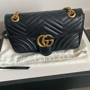 Gucci- GG Marmont small matelasse shoulder bag.